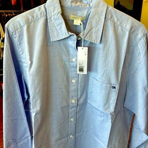 Outerknown blue button down shirt.